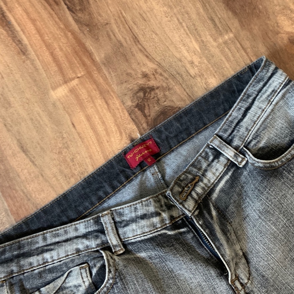 Faded jeans. Boot cut.